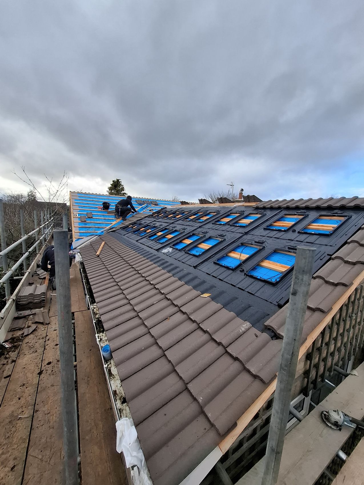 Re-roof with rooflights over a new extension